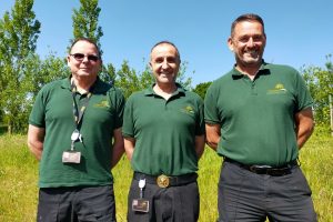 A happy band of crem techs and gardener